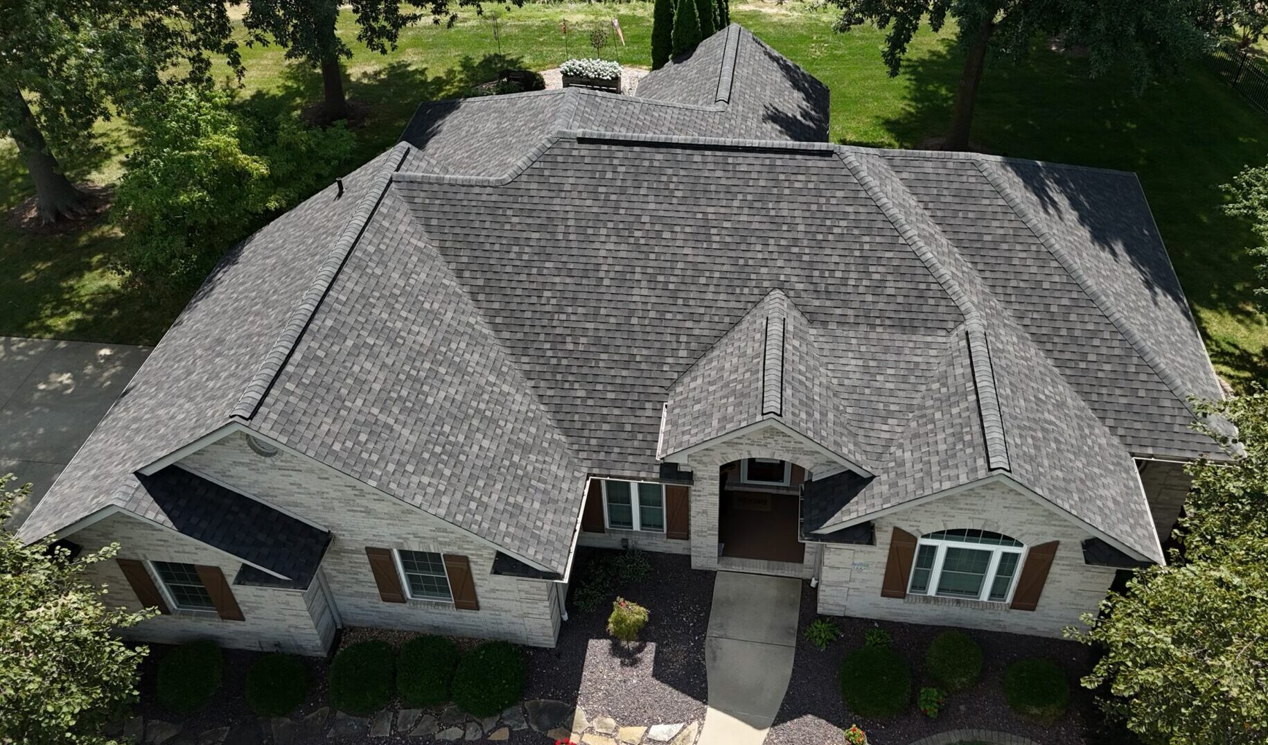Read more about the article What Is a Roofing System? A Homeowner’s Guide to the Parts of a Roof
